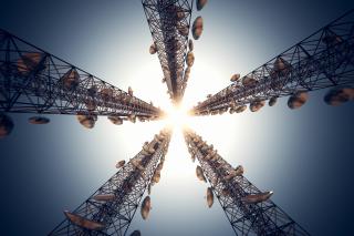 Five tall telecommunication towers