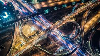 Aerial view of highway at night, road intersection